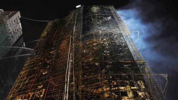 指的是2010年11月15日发生在上海余姚路胶州路的一栋高层公寓起火事件