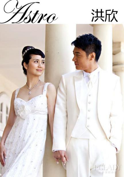 洪欣和张丹峰结婚照片 相差近10岁姐弟恋如今儿女双全